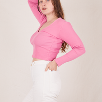 Side view of Long Sleeve V-Neck Tee in Bubblegum Pink worn by Allison