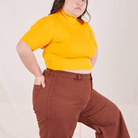 1/2 Sleeve Essential Turtleneck in Sunshine Yellow side view on Ashley wearing fudgesicle brown Bell Bottoms