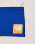 Big Pouch in Royal Blue with Big Bud Press label in orange and yellow