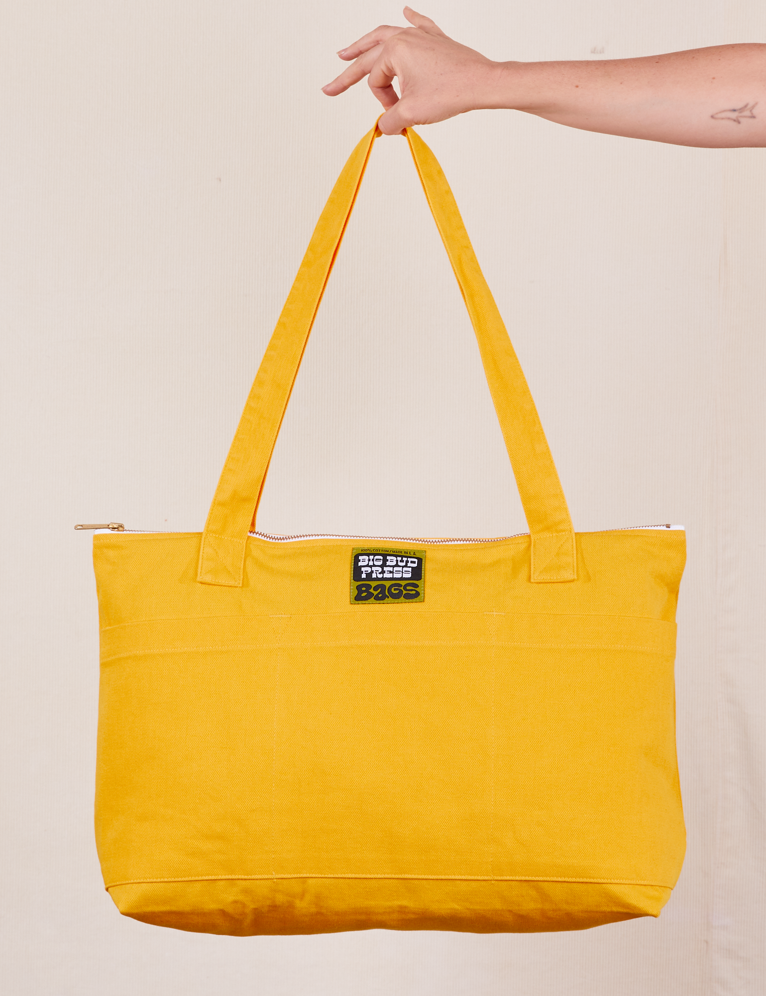 XL Zip Tote in Sunshine Yellow held by model