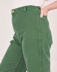 Side view close up of Bell Bottoms in Dark Emerald Green worn by Allison