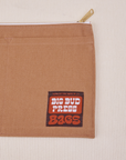 Big Pouch in Tan with Big Bud Press label in brown and orange