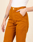 Work Pants in Spicy Mustard close up with hand in pocket