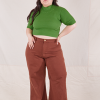 1/2 Sleeve Essential Turtleneck in Bright Olive on Ashley wearing fudgesicle brown Bell Bottoms