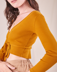 Wrap Top in Spicy Mustard side view on Alex