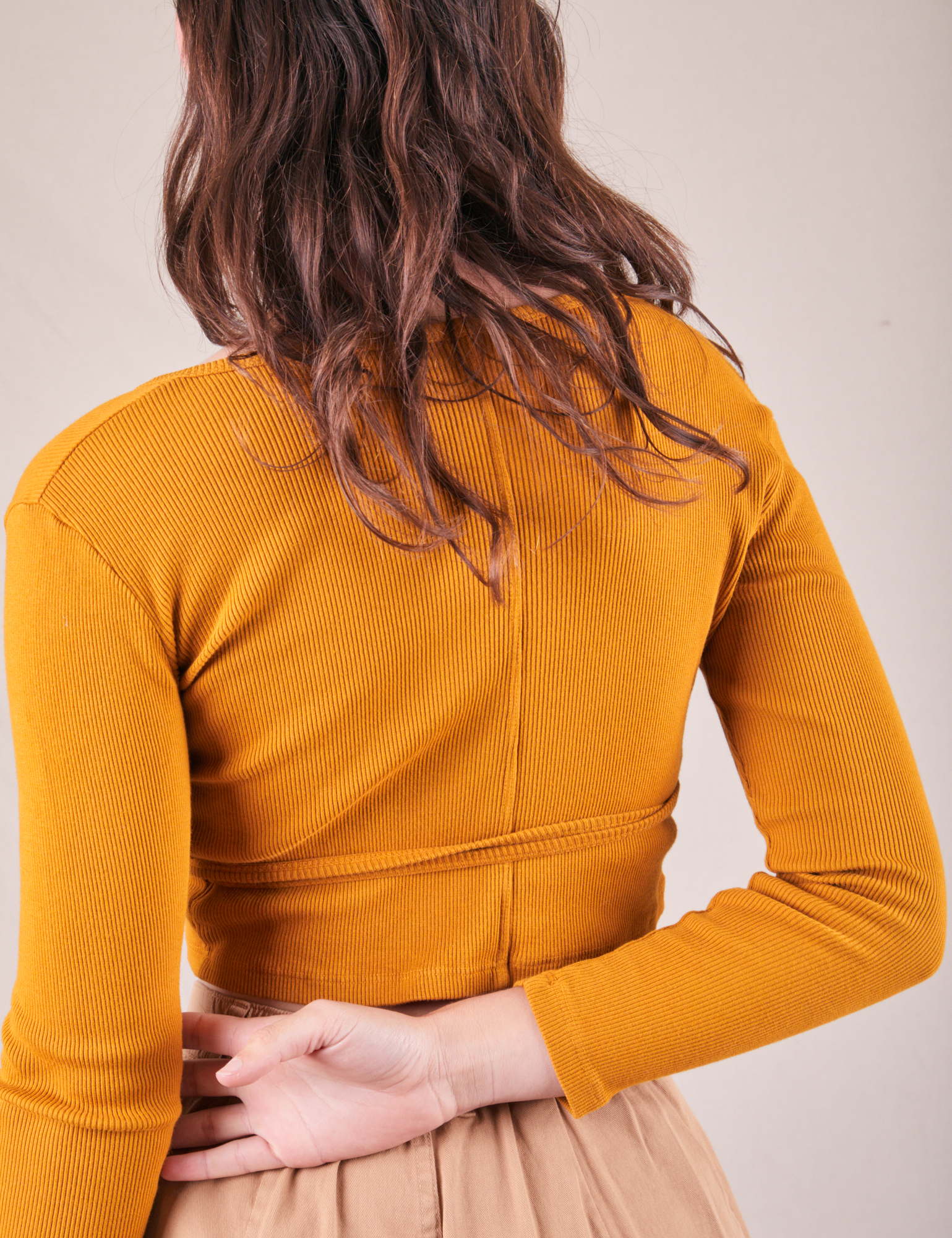 Wrap Top in Spicy Mustard back view on Alex