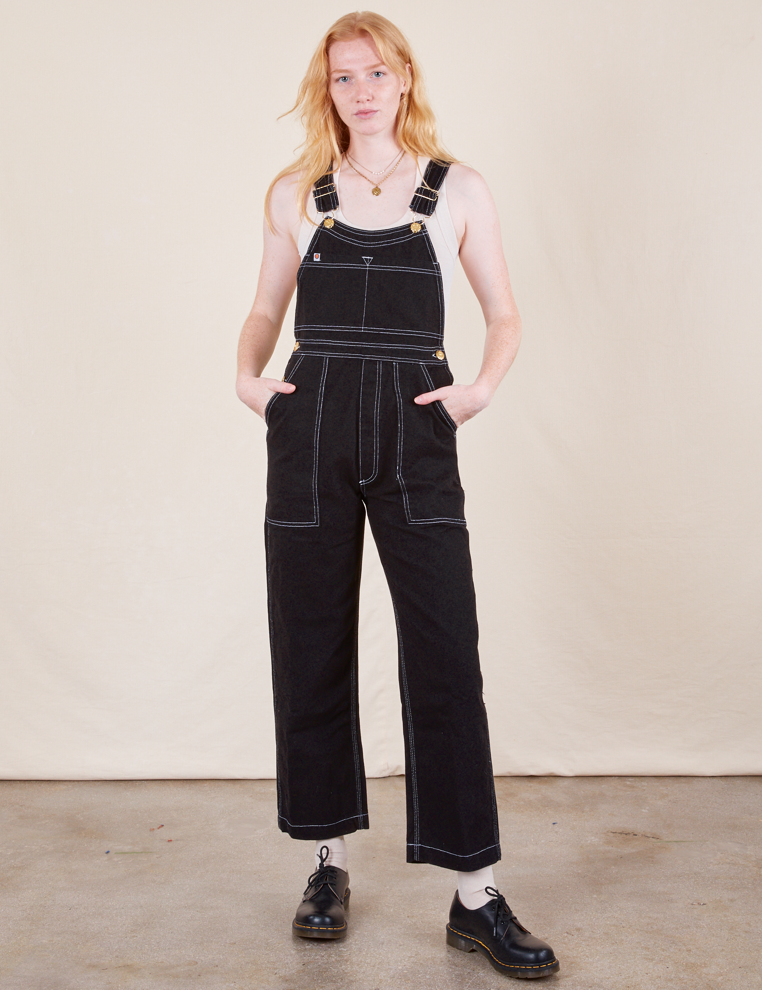 Margaret is 5&#39;11&quot; and wearing XXS Original Overalls in Basic Black