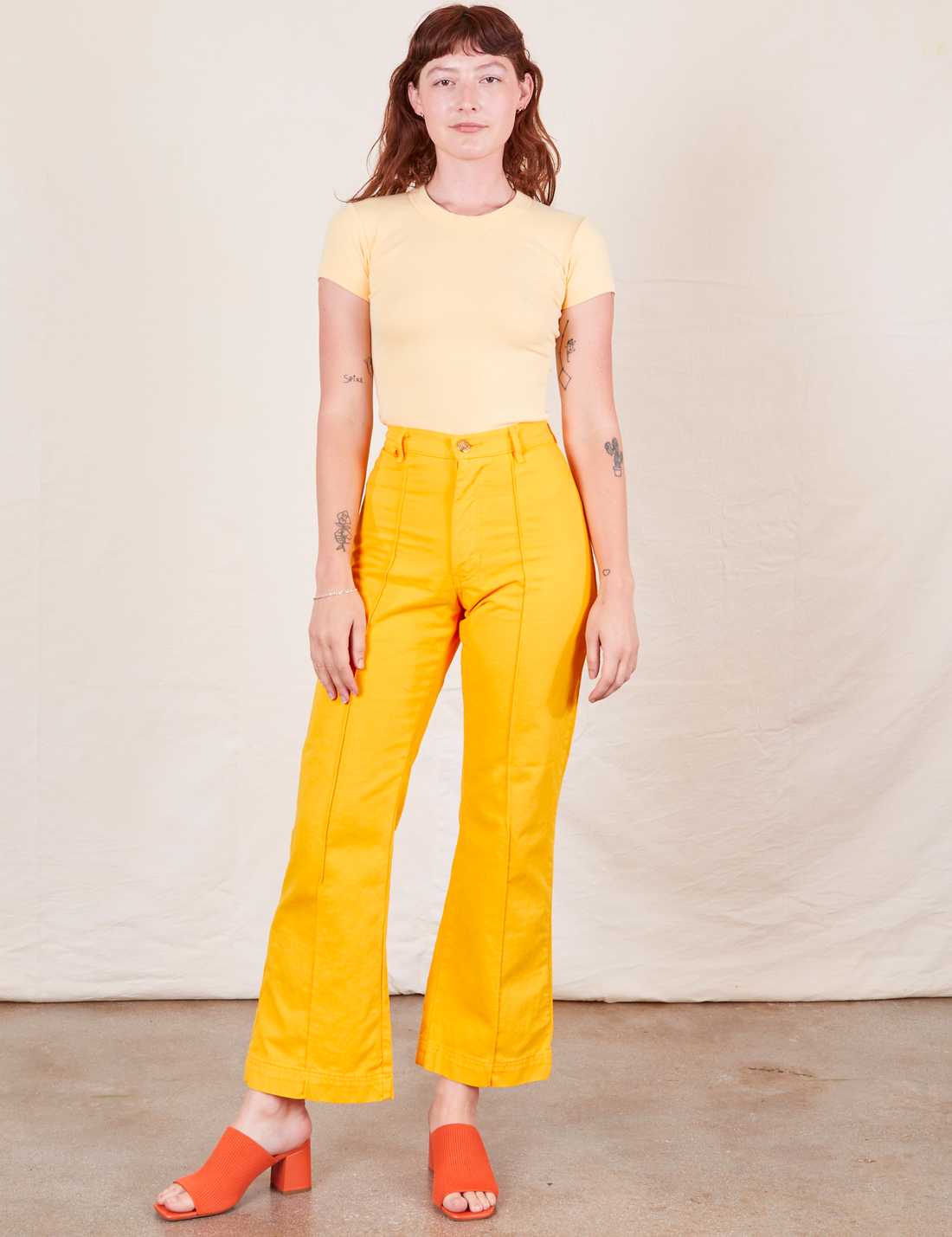 Western Pants in Sunshine Yellow on Alex wearing butter yellow Baby Tee