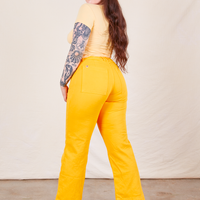 Western Pants in Sunshine Yellow back view on Sydney wearing butter yellow Baby Tee