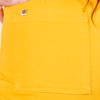 Western Pants in Sunshine Yellow back pocket close up on Sydney