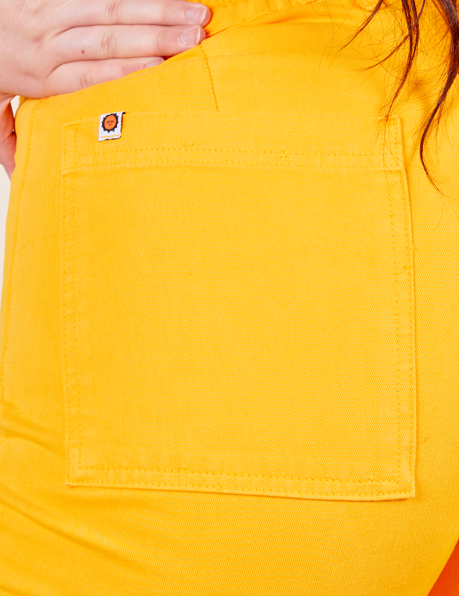 Western Pants in Sunshine Yellow back pocket close up on Sydney