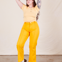 Western Pants in Sunshine Yellow on Sydney wearing butter yellow Baby Tee