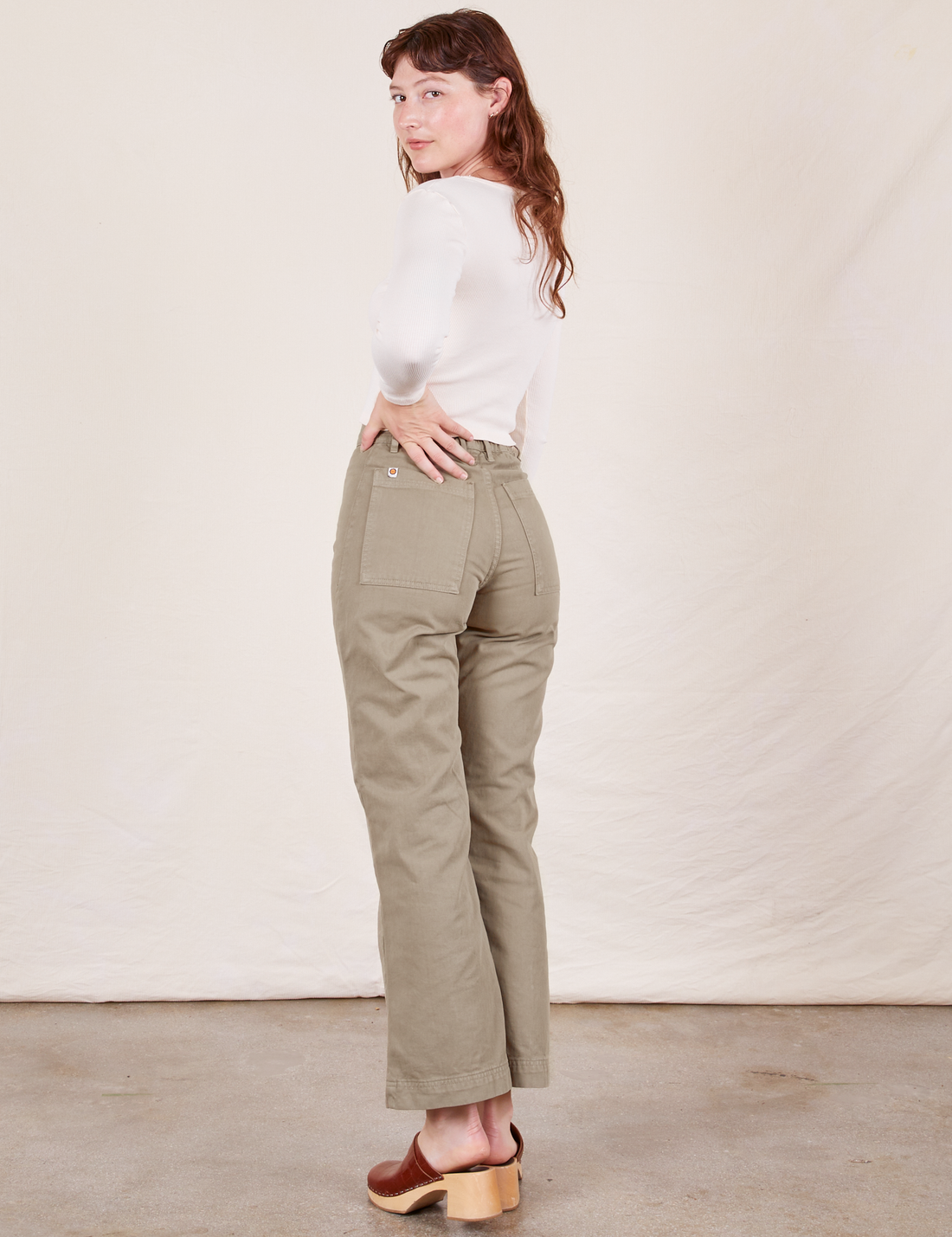 Western Pants in Khaki Grey back view on Alex wearing vintage off-white Long Sleeve V-Neck Tee