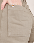 Western Pants in Khaki Grey back pocket close up on Alex
