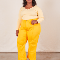 Western Pants in Sunshine Yellow on Morgan wearing butter yellow Long Sleeve V-Neck Tee