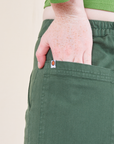 Work Pants in Dark Emerald Green back pocket close up on Margaret