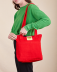 Over-Shoulder Zip Mini Tote in mustang red worn by model