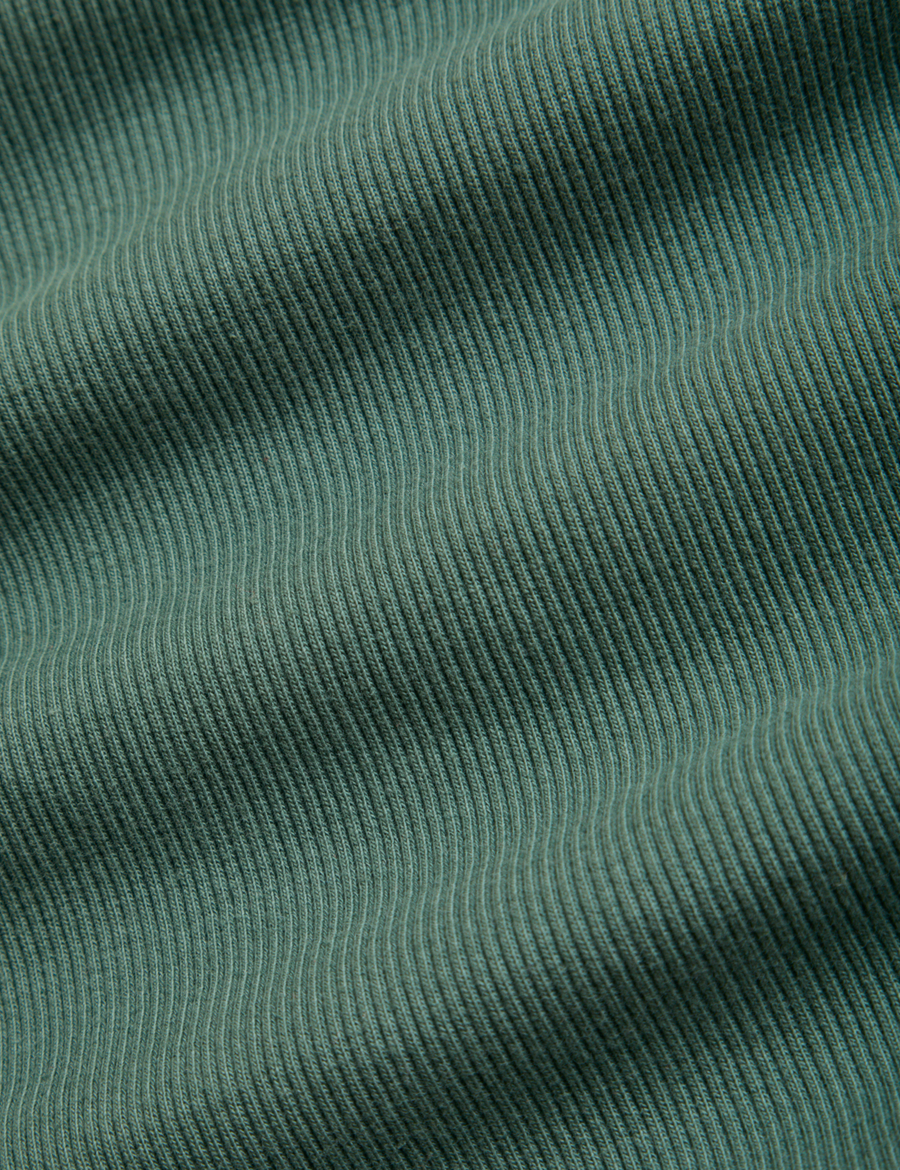 Sleeveless Essential Turtleneck in Emerald Green fabric detail