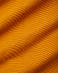 Sleeveless Essential Turtleneck in Spicy Mustard fabric detail