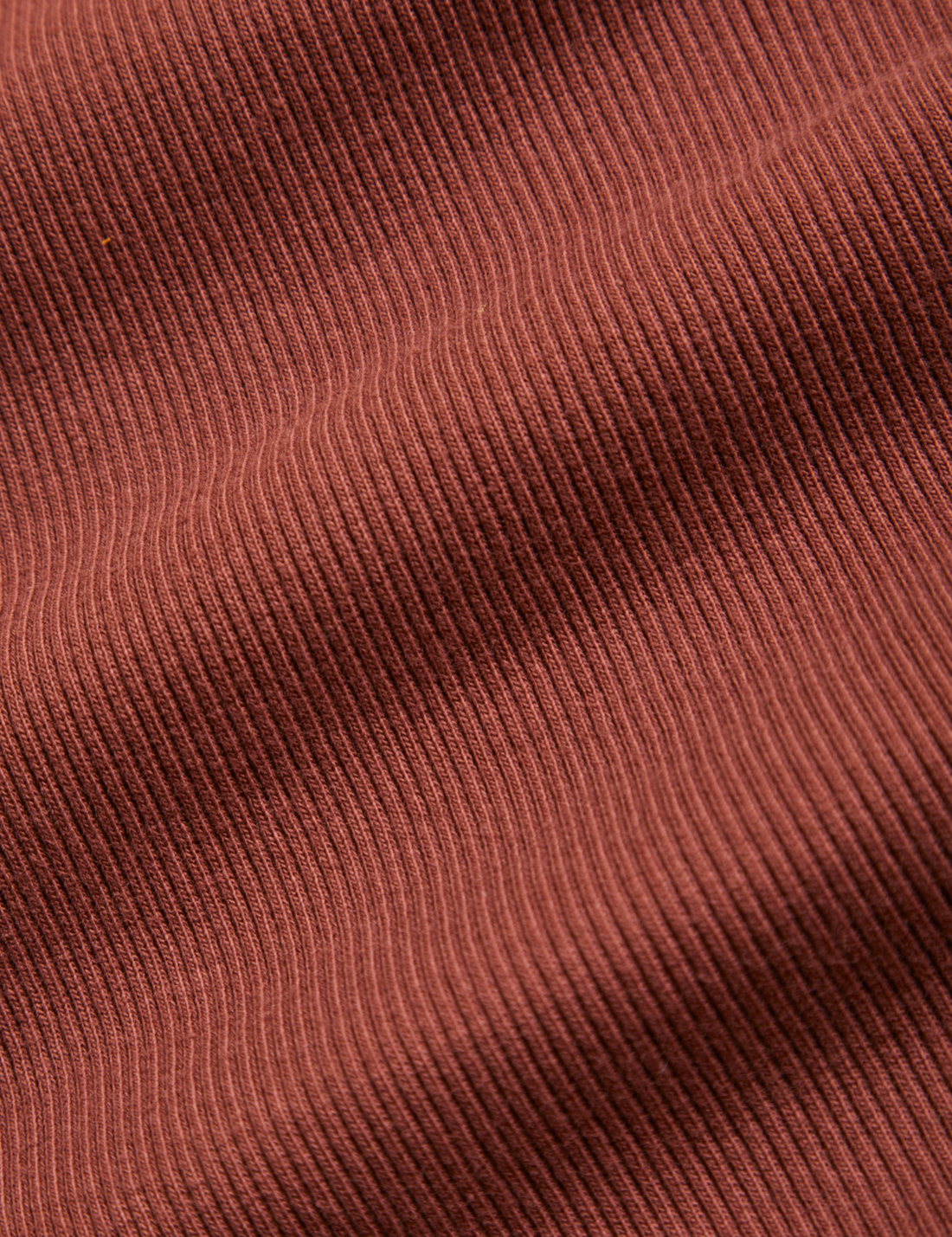 Essential Turtleneck in Fudgesicle Brown detail close up of knit fabric