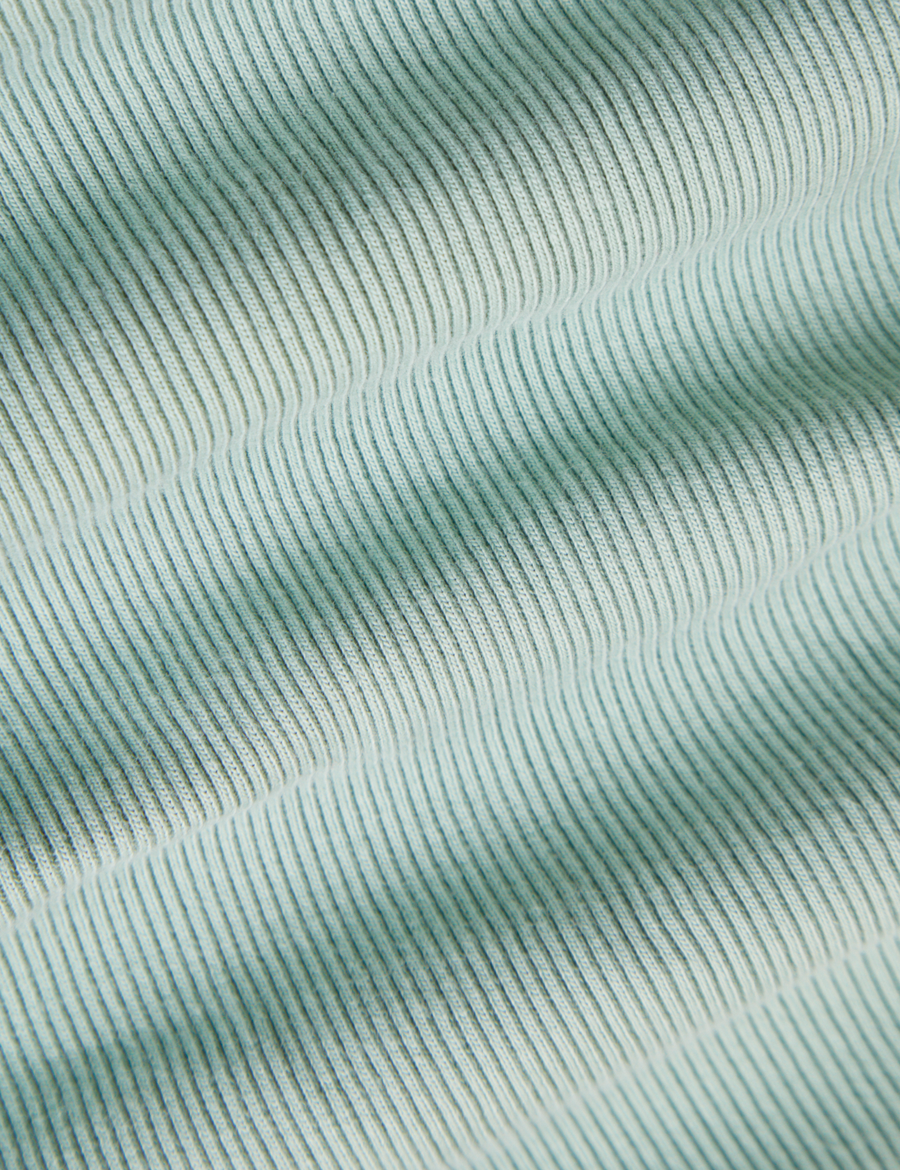 Essential Turtleneck in Sage Green detailed close up of knit fabric