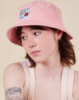 Big Bud Bucket Hat in baby pink worn by Hana