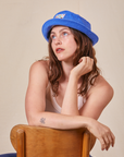Big Bud Bucket Hat in cornflower blue worn by Allison