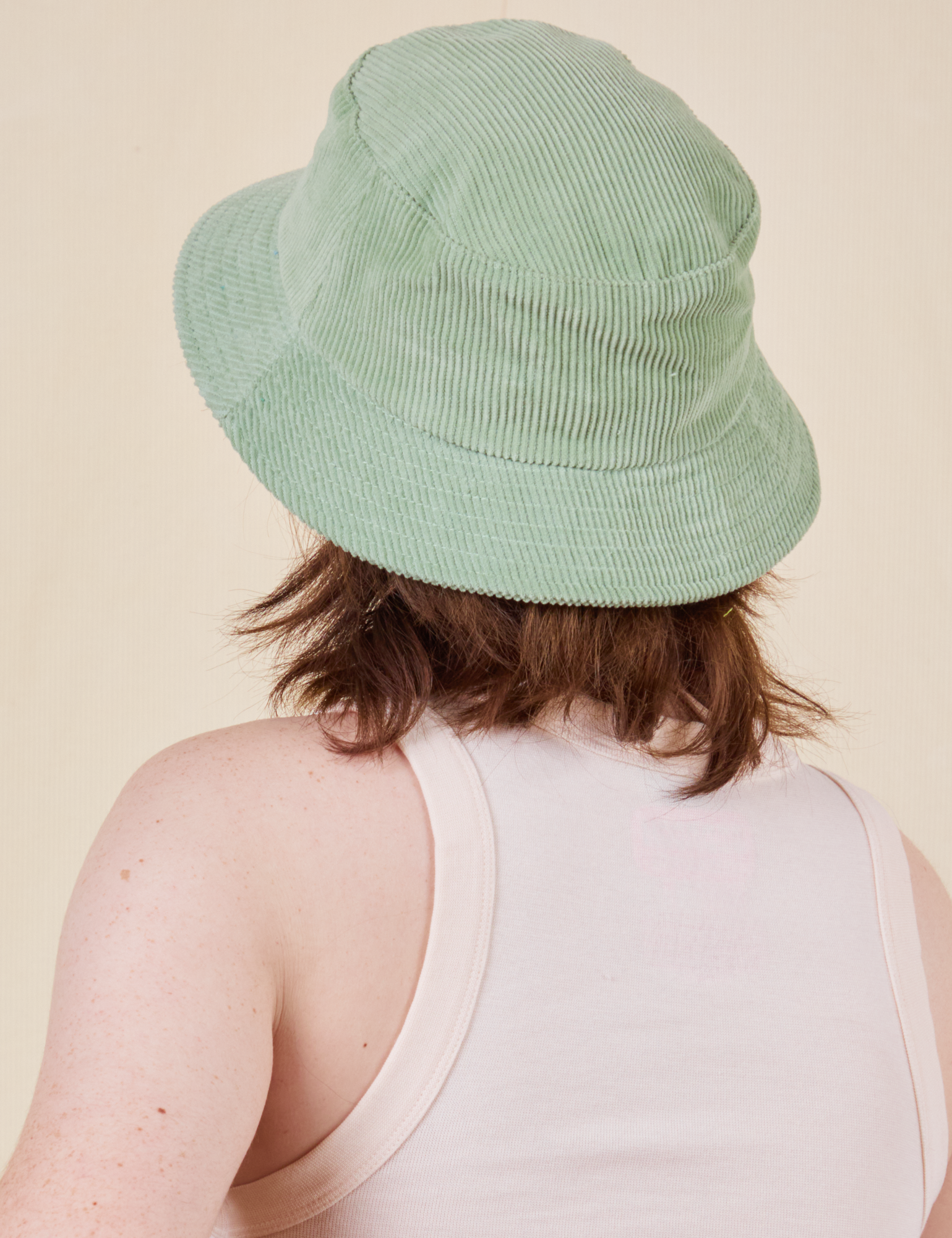 Big Bud Bucket Hat in sage green back side on Hana
