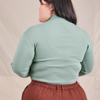 Back view of Essential Turtleneck in Sage Green worn by Ashley