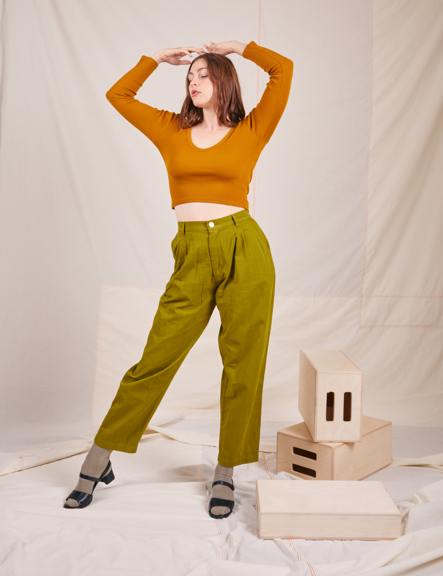 Long Sleeve V-Neck Tee in Spicy Mustard on Allison wearing olive green trousers