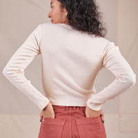Back view of Long Sleeve V-Neck Tee in Vintage Tee Off-White worn by Blair