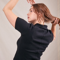 Back view of Fisherman Polo in Basic Black worn by Allison