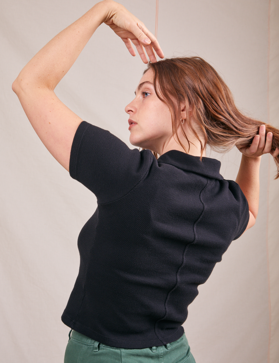 Back view of Fisherman Polo in Basic Black worn by Allison