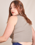 Back view of Sleeveless Essential Turtleneck in Khaki Grey worn by Allison