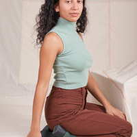 Sleeveless Essential Turtleneck in Sage Green side view on Blair