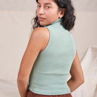 Sleeveless Essential Turtleneck in Sage Green back view on Blair