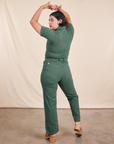 Back view of Short Sleeve Jumpsuit in Dark Emerald Green back view on Melanie
