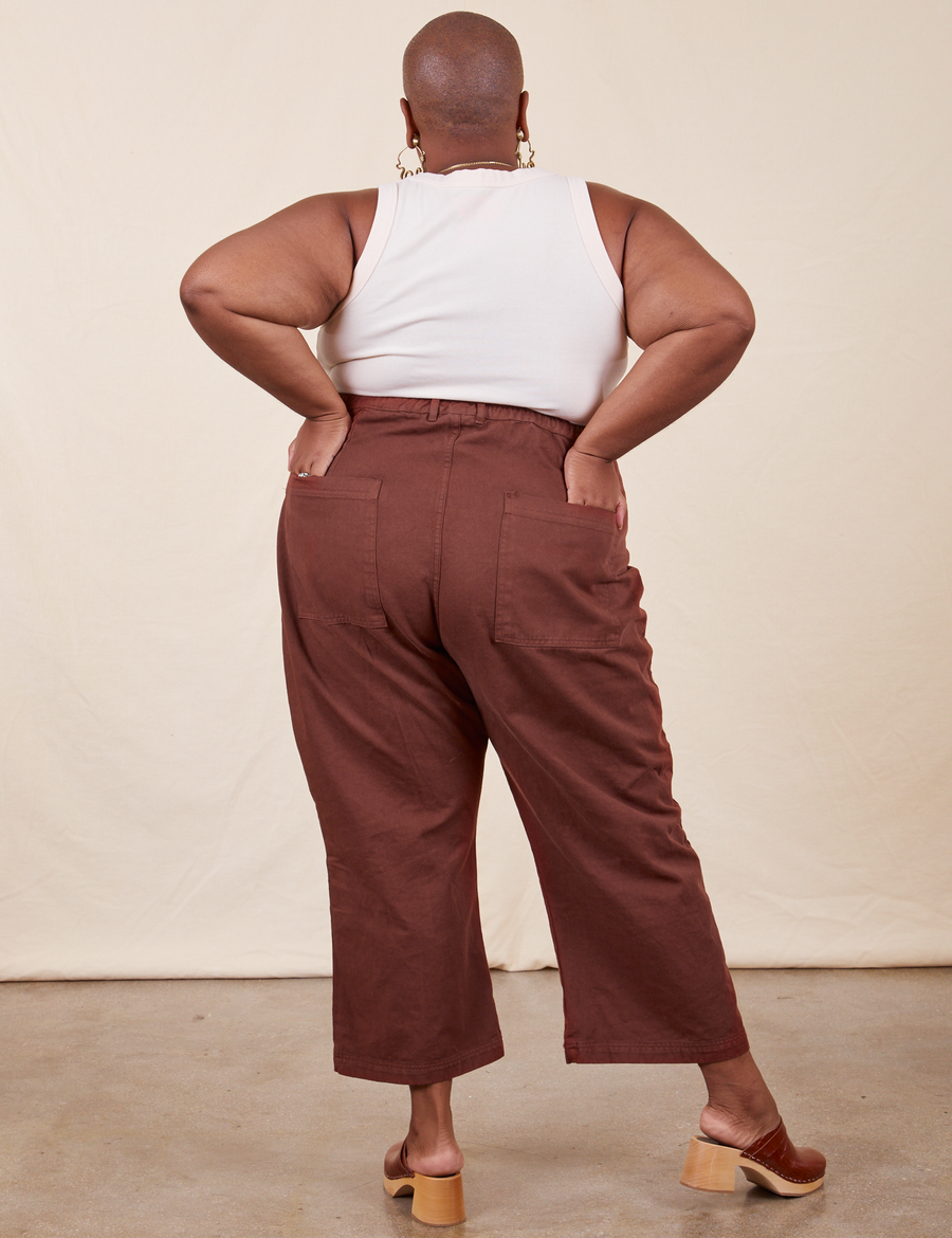 Petite Western Pants in Fudgesicle Brown back view on Crystani with hands in back pockets