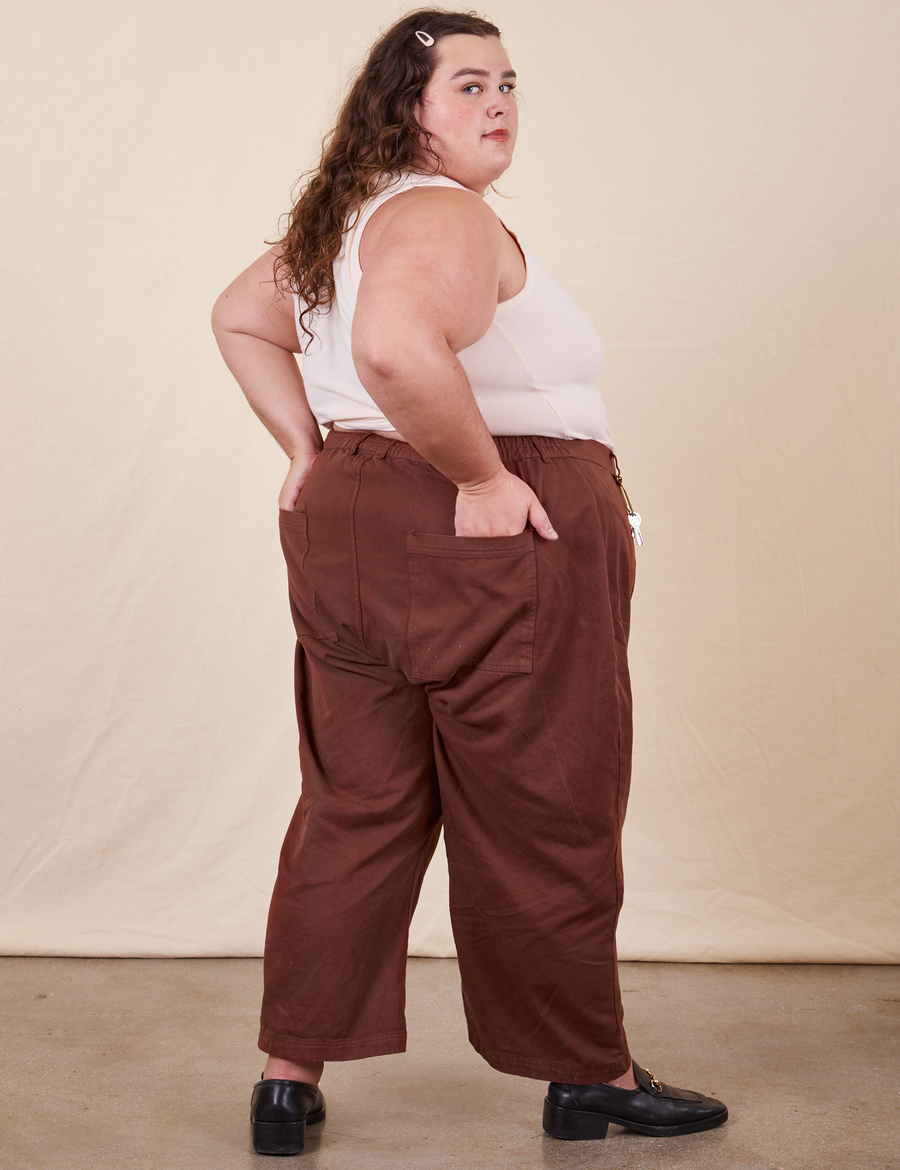 Petite Western Pants in Fudgesicle Brown back view on Mara with hands in pockets